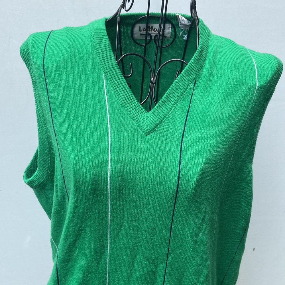 Green sweater vest by La Mode. Vintage v-neck vest